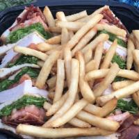 Turkey Club Sandwich · Turkey, bacon, lettuce, tomato, and mayo.