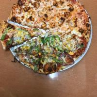 Spicy Paneer Pizza · Spicy sauce, paneer, garlic, ginger, red onion, bell pepper, cracked black pepper, fresh cil...