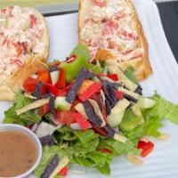 Lobster Roll · Lobster chunks tossed in signature sauce and sprinkled with celery, green onions and peppers...