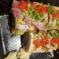 5 Season Roll · Spicy tuna, kanikama and tempura flakes topped with seared tuna, yellowtail, garnished with ...