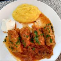 Cabbage Rolls · House Special. (Sarmale) 4 pieces. Homemade cabbage rolls. Stuffed with ground pork, beef, r...