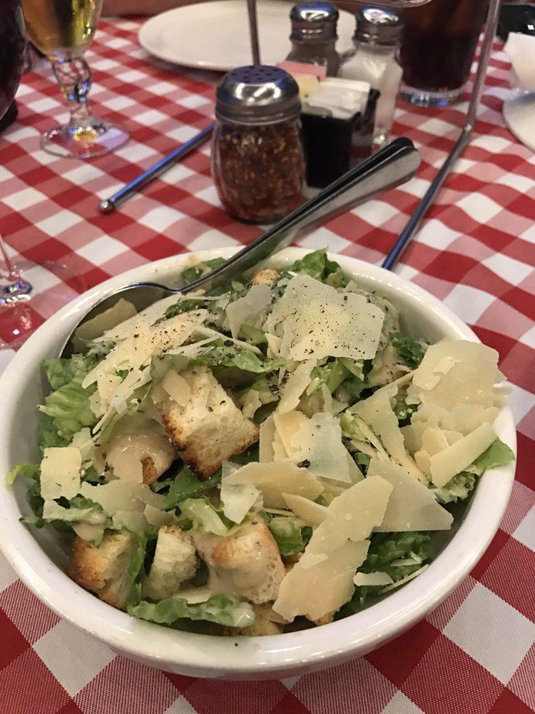Caesar Salad · Romaine lettuce shaved Italian cheese, coal oven baked croutons, traditional Caesar dressing. Add Genoa salami, fresh mozzarella or grilled chicken for an additional charge.