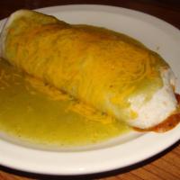 Super Burrito · Beef, chicken or pork, beans, avocado lettuce. Topped with melted cheese and our verde sauce.