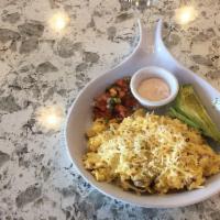Migas · A Tex-mex egg scramble with spicy chorizo sausage, pico de gallo and pepperjack cheese over ...