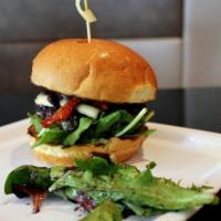 French Connection Burger · Brie cheese, sauteed crimini mushrooms, basil  pesto, sun dried tomatoes, spinach, and sun-d...