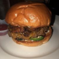 Texas Cheeseburger · Sharp Cheddar cheese, jalapeno, caramelized onion, applewood smoked bacon, spicy mustard and...