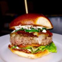 Swiss Bacon Blue Burger · Swiss cheese, blue cheese, applewood smoked bacon, caramelized onion, arugula and garlic aio...