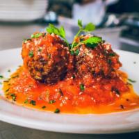 Meatball · Ground beef, cheese, garlic, and served with marinara sauce.One meat ball pur order
