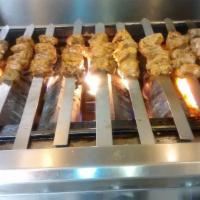 Lamb Kabob · 6 piece char-broiled tender fillet of lamb cooked on open fire to perfection. Served with ba...