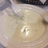 Clam Chowder · A thick hearty soup consisting of clams, potatoes, onions within a milk or cream base.