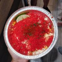 Xxtra Flamin Hot Cheetos Elote Combo · Grilled corn topped with mayonnaise, cotija cheese, dusted with Xxtra Flamin' Hot Cheetos, C...