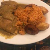 African Curry Chicken · Chicken thigh cooked with curry and other  spices. Served with rice.