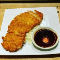 Katsu · Crispy golden breaded chicken or pork cutlet served with katsu sauce.