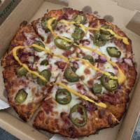 Hot Pastrami Pizza · Seasoned Pastrami, Pickled Jalapenos, Red Onions, Spicy Red Sauce topped with Fresh Tangy Mu...