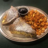 Stuffed French Toast · Scrambled eggs with cheese and your choice of ham, bacon, or sausage stuffed between French ...