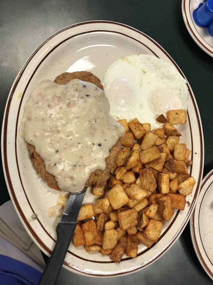 Country Fried Steak · A hand battered country fried steak, topped with grandma's country gravy and served with two eggs, habla diablo seasoned potatoes and your choice of toast or banana nut muffin.