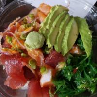 Poke Bowl · Served with avocado, cucumber, lettuce, carrots, broccoli, tempura flakes, spicy mayo, and s...