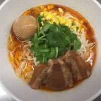 Miso Ramen · 8-hour pork belly, 12-hour tonkotsu broth tamago, corn, cabbage scallions, bean sprouts and ...