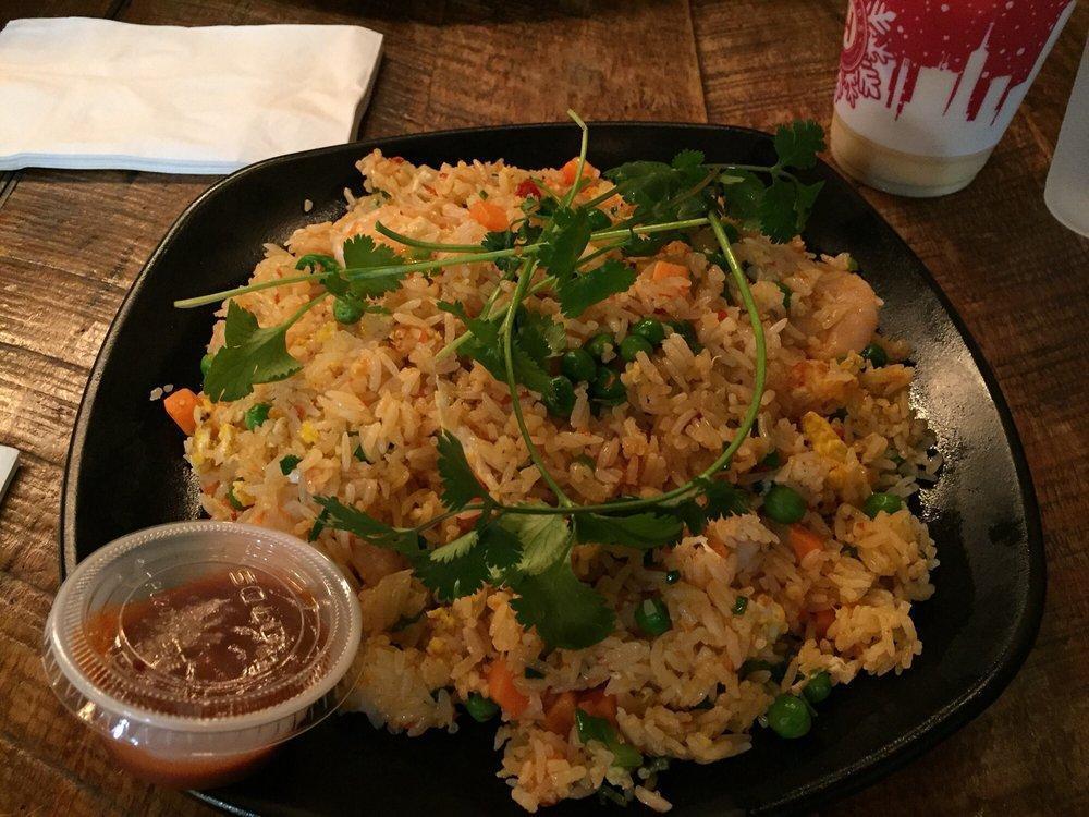 Shrimp Fried Rice · Fried rice topped with carrots, peas and shrimp.