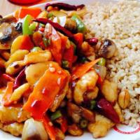 Kung Pao · Spicy brown sauce. Green and red peppers, onions, scallions, mushrooms, peanuts, carrots and...