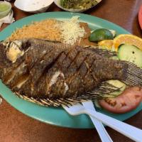 Mojarra Frita Plate · Fried tilapia fish.