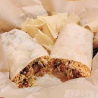 Fiesta Burrito · Non-GMO rice, organic beans, cheese, guacamole, sour cream and salsa verde.