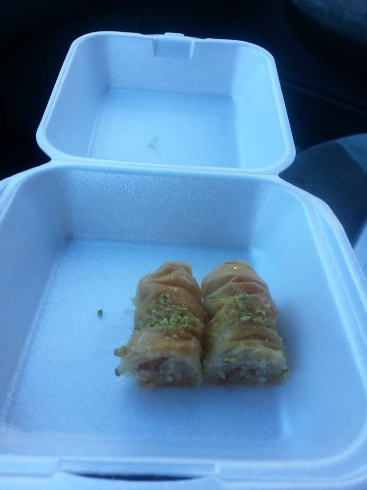 Baklava · Layers of filo pastry filled with cheese, sweetened with syrup and topped with pistachios.