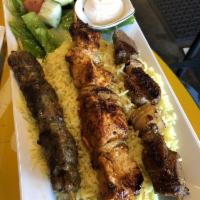 Combo Platter · 1 skewer each of lamb, chicken and kafta kebabs, served with our signature garlic dipping sa...
