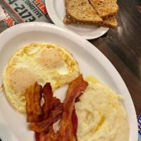 Country Breakfast · 2 eggs with bacon or sausage. Home fries or grits, biscuit and sausage gravy.  