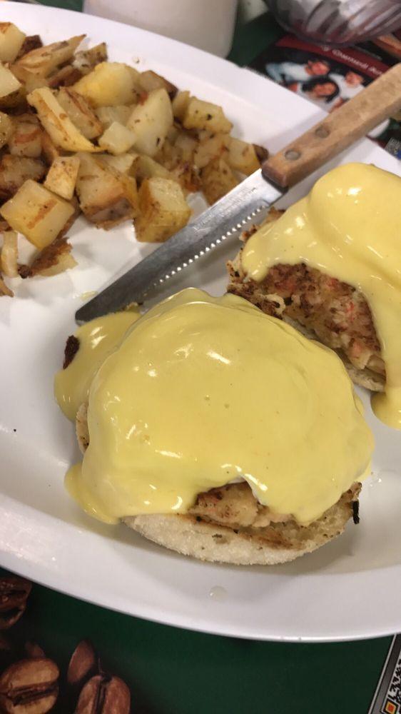Crab Cake Benedict · 2 grilled cakes with choice of grits or home fries.  