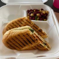 Chicken Pesto Panini · Grilled chicken breast, pesto sauce, red onions, roasted peppers.