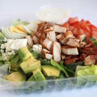 Cobb Salad · Mixed greens, Roma tomatoes, feta cheese, avocado, bacon, egg, grilled chicken and ranch dre...