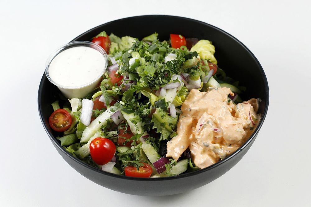 Buffalo Chicken Salad · Organic spring mix, cucumber, tomato, homemade ranch dressing with Buffalo chicken (chicken breast marinated with diced celery, red onions, homemade mayo, chilly Buffalo sauce, lemon juice, minced garlic).