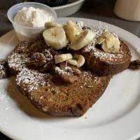 Banana Nut French Toast · The banana nut French toast is a crowd favorite. Banana nut bread grilled then topped with s...