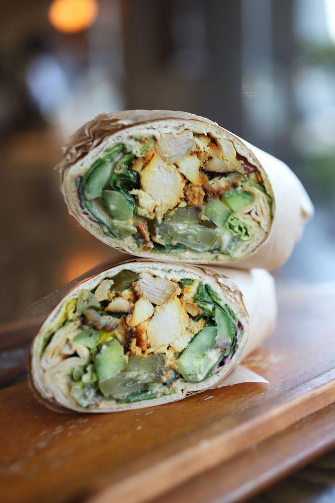 Chicken Kabob Wrap · Wrapped with romaine lettuce, cucumbers, tomatoes, pickles, hummus spread, tahini and garlic sauce.