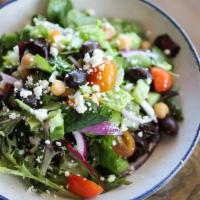 Mediterranean Salad · Romaine lettuce, cucumbers, tomatoes, red onions, garbanzo beans and olives topped with feta...