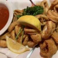 Fried Calamari · Served with spicy or mild red sauce. Squid.