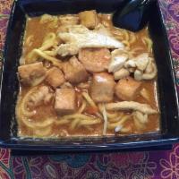 Laksa Lemak · Aromatic spicy Malaysian curry noodle soup with tofu, bean sprouts, chicken and shrimp.