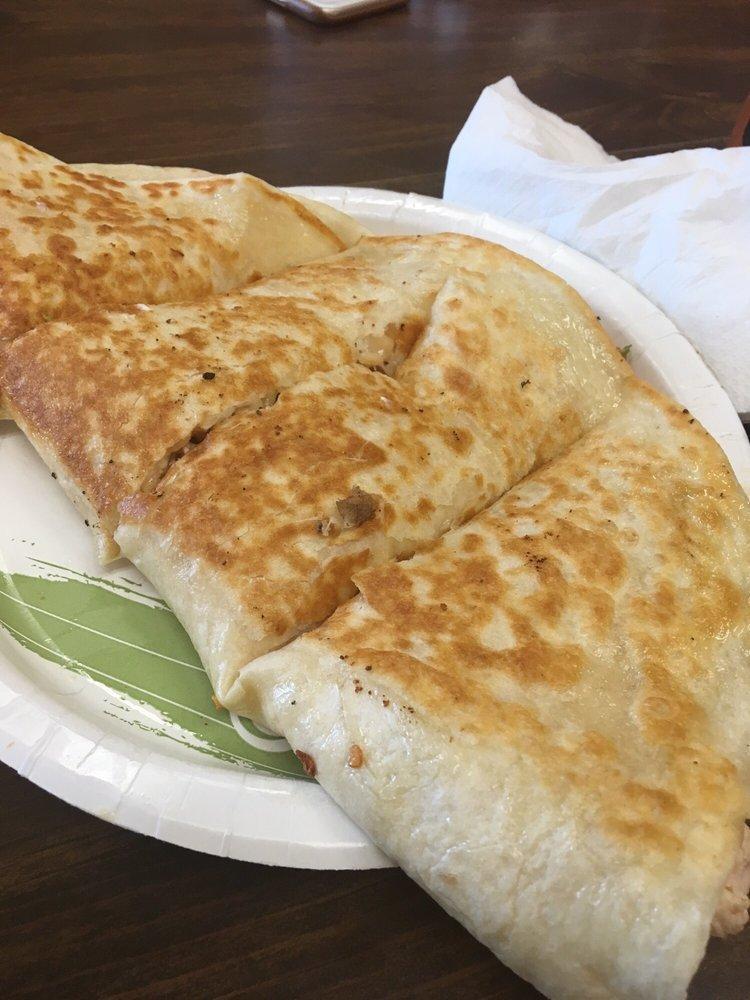 Chicken Quesadilla · Marinated and roasted. Grilled large flour tortilla. Includes cheese, salsa and hot sauce.