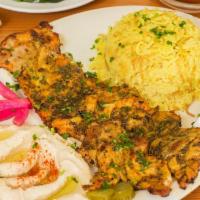 Chicken Fillet Kabob Plate · Served with rice, hummus, salad and pita.