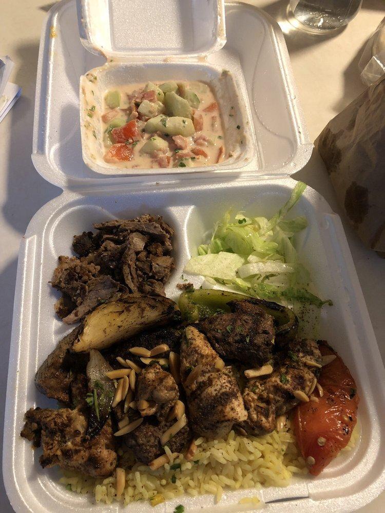 Combination Plate · A combination of Kefta Kabob, Shish Kabob, Chicken Kabob, and Chicken Shawerma served with rice, Jerusalem salad, and pita bread.