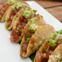 Tuna Tacos · Avocado, cucumber, micro cilantro and soy vinaigrette.