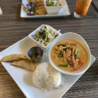 Panang Curry · Green beans and red bell peppers in coconut panang curry cream sauce. Served with choice of ...
