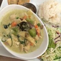 Green Curry · Bamboo shoots, peas, carrots, bell peppers and basil in coconut red curry sauce. Served with...
