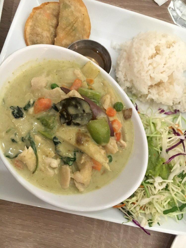Green Curry · Bamboo shoots, peas, carrots, bell peppers and basil in coconut red curry sauce. Served with choice of protein and choice of rice.
