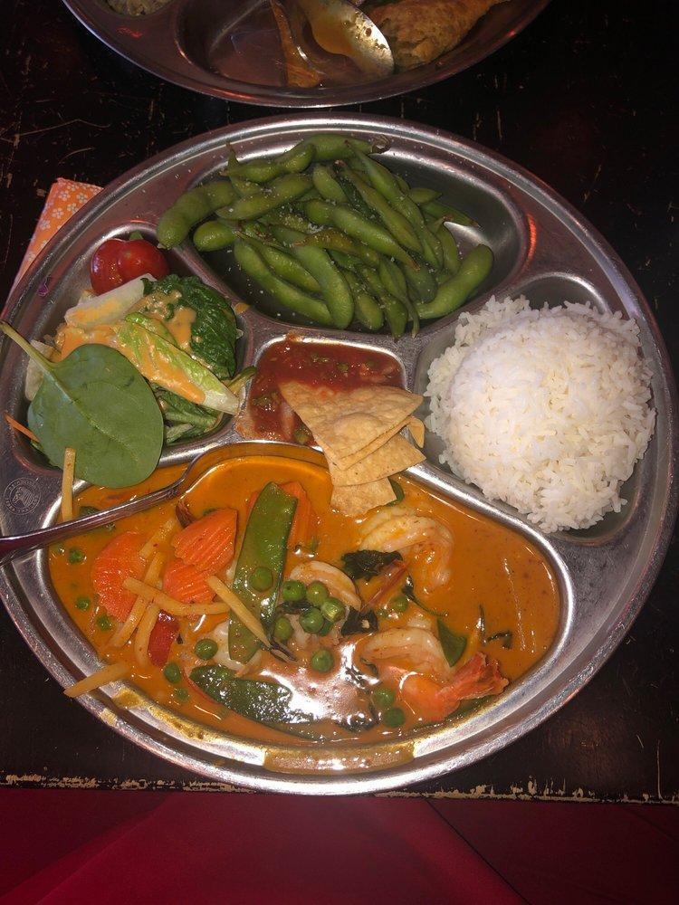 Red Curry · Bamboo shoots, basil, carrots, snow peas and bell peppers simmered in coconut milk.