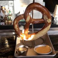 German Pretzel · A WOB original and tavern favorite. A giant Bavarian pretzel baked soft on the inside, crisp...