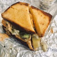 Santa Fe Grilled Chicken Sandwich · Sliced grilled chicken breast, melted Swiss, green chili, avocado and chipotle mayo on grill...