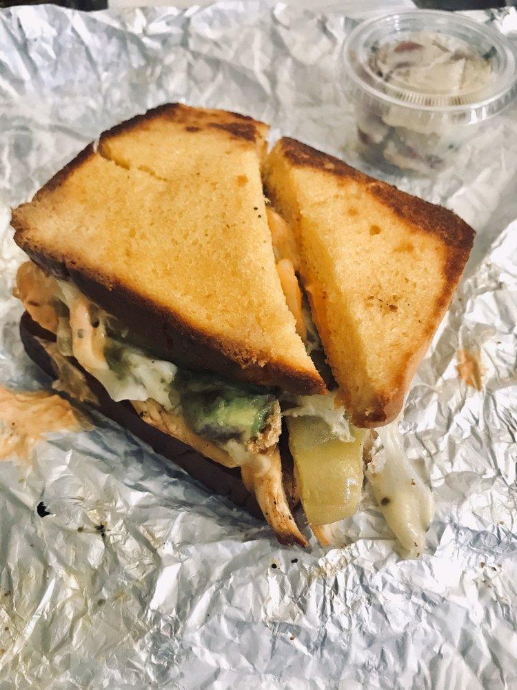 Santa Fe Grilled Chicken Sandwich · Sliced grilled chicken breast, melted Swiss, green chili, avocado and chipotle mayo on grilled sourdough.