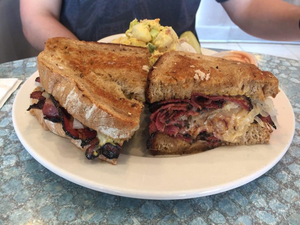Rudy's Reuben Sandwich · Corned beef, pastrami or turkey, Swiss, sauerkraut and deli mustard on rye bread with a side of Thousand Island dressing.